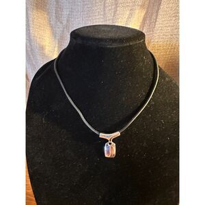 Lia Sophia Silver Tone Pendant with Leather Cord